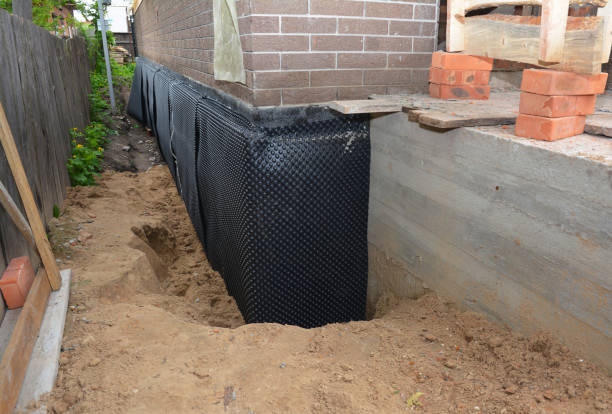 Happy homeowners after waterproofing job in Sherwood
